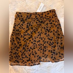 Francesca’s brown and black cheetah skirt size: M